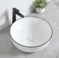 Umywalka-Nablatowa-Ceramiczna-Okragla-Bialy-Polysk-Czarny-Rant-36x12-Material-wykonania-Ceramika-680x672.jpg